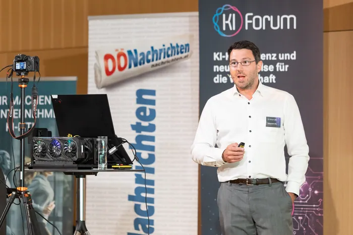 Speaker presenting with advanced technology demonstration